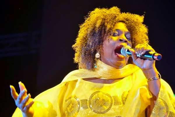 Judy Mowatt performing on stage